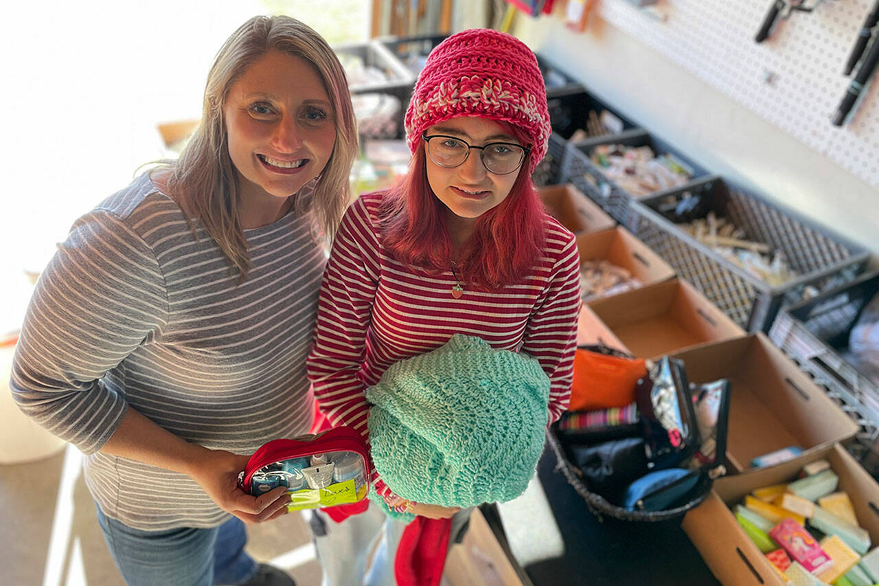 Sequim Gazette photo by Matthew Nash
This will be River Jensens final year doing Rivers Christmas Project gathering, prepping and delivering toiletry bags to area agencies for those in need. Shes worked with her mom Anna Larsen the last eight years to coordinate donations for the project from adults.