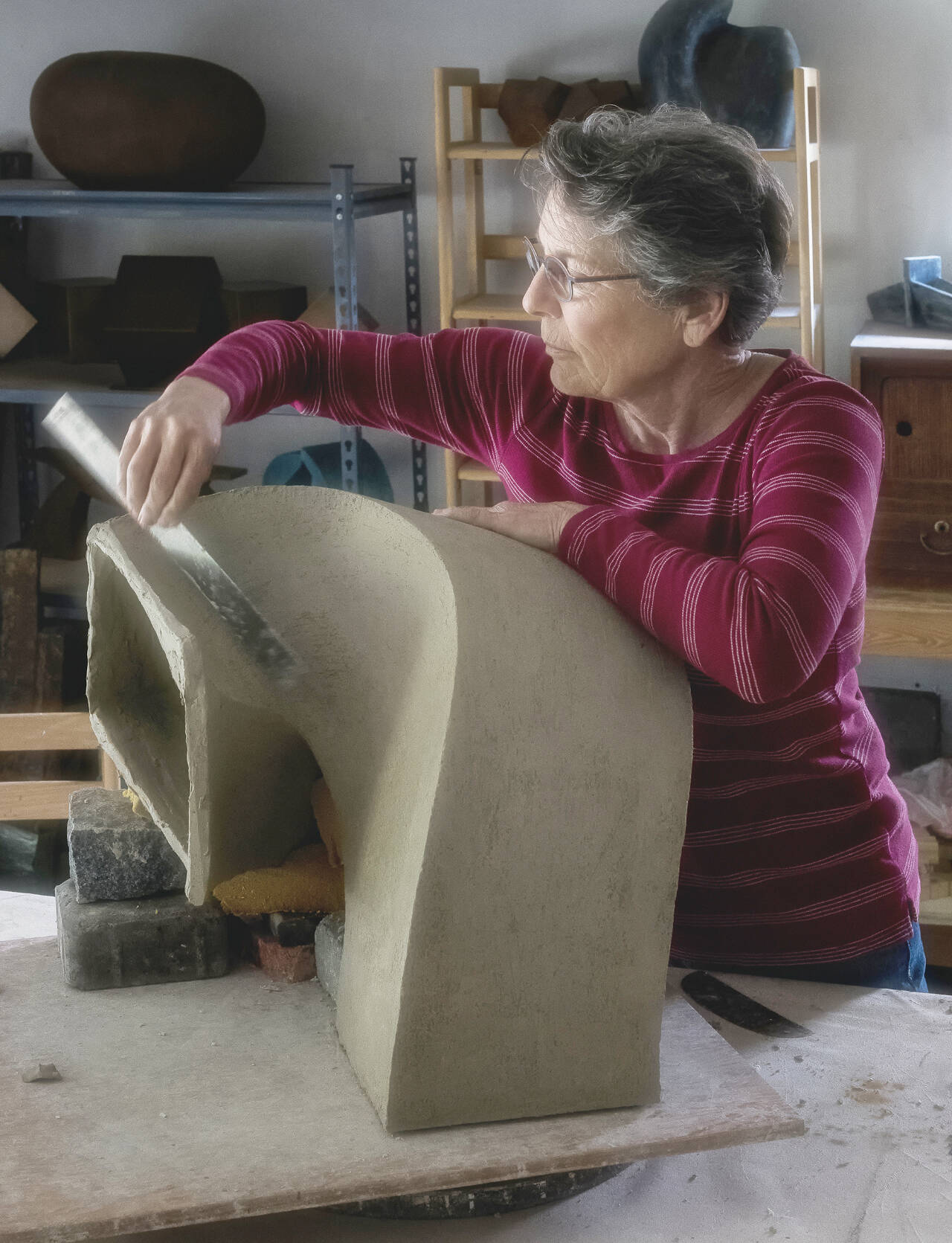 Photo courtesy of Peninsula College / Sculptor Jan Hoy (pictured) and photographer Harry von Stark see their artistry on display in a dual exhibit at Peninsula Colleges PUB Gallery of Art through Jan. 26.