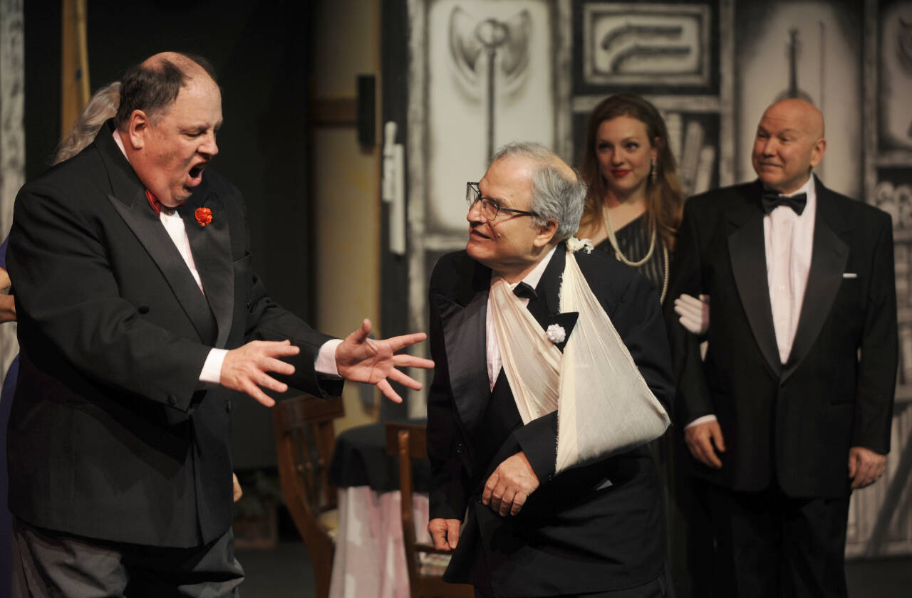 Sequim Gazette photos by Michael Dashiell
Felix Geisel (portrayed by Steve Rodeman) speaks with William Gillette (Joel Hoffman) in an early scene of Olympic Theatre Arts The Games Afoot or Holmes for the Holidays. Looking on are Aggie Wheeler (Merrin Packer) and Simon Bright (Stephan Willms). The play opens Dec. 1.