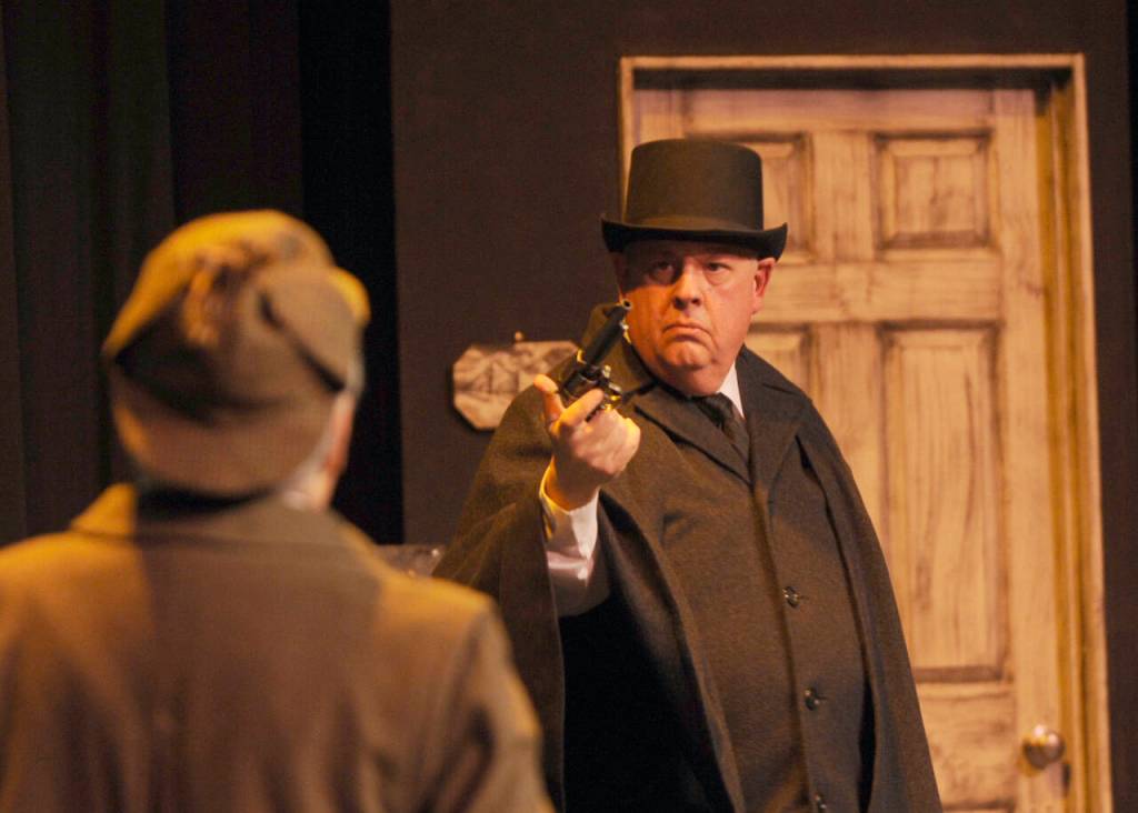 Olympic Theatre Arts veteran Steve Rodeman, right, portrays actor Felix Geisel portraying Moriarty in a play-with-in-a-play in OTAs upcoming production of The Games Afoot or Holmes for the Holidays.