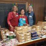 Photo courtesy of Sequim Guild of Seattle Childrens Hospital
Robbie Justyn, Renee Jones and Elaine OBrien oversee baked good items in The Guild Room at a previous Holiday Bazaar hosted by the Sequim Guild of Seattle Childrens Hospital. This years event is set for Nov. 18.