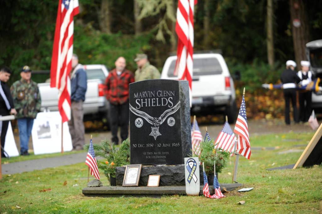 Sequim Gazette photo by Michael Dashiell / The community honors Medal of Honor recipient construction mechanic third class Marvin G. Shields, at Gardiner Community Cemetery on Nov. 11. Shields is the only Navy Seabee to have received the Medal of Honor. He was posthumously awarded the Medal of Honor for heroism above and beyond the call of duty in the Vietnam War. A native of Gardiner, Shields was buried with a Marine Corps honor guard at the Gardiner Cemetery on June 19, 1965.