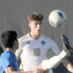 Photo by Keith Thorpe/Olympic Peninsula News Group
Peninsulas Nil Grau gives a high kick to keep the ball out of reach of Edmonds Enzo Buenaventura during a match at Wally Sigmar Field in October. Grau was recently named NWAC North Regions Most Valuable Player.