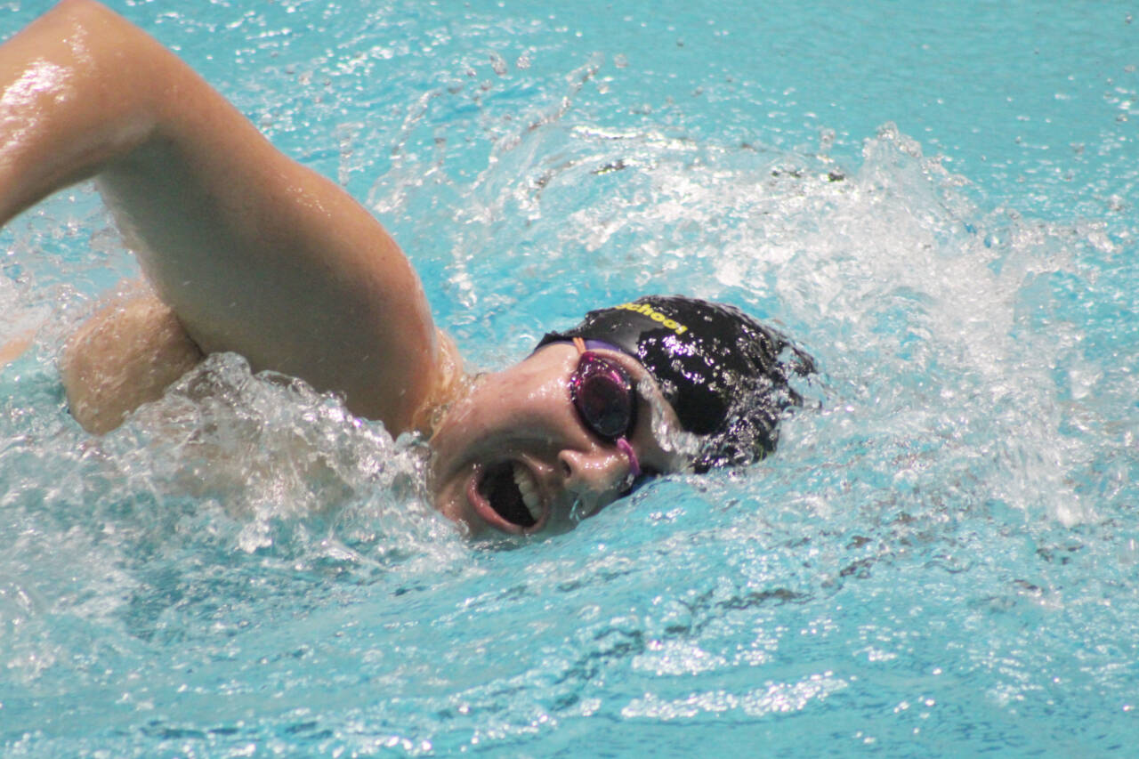 Photo courtesy of Eric Ellefson / Sequims Melia Nelson swims in the 400 free relay at the class 2A state meet in Federal Way last week. The Wolves placed 15th in the event and 20th overall.