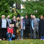 Sequim Gazette photos by Michael Dashiell
Representatives from Black Bear Diner and Sequim Holiday Inn Suites present Betsy Reed Schultz (center), founder of Captain Joseph House, with a carved bear to enhance the outdoor area at the Port Angeles respite facility. The donation also came with a $2,500 donation from Black Bear Diners corporate office. Pictured are, from left: Namaste Stayton, vice president of hotel operations with Wirta Hospitality Worldwide; Yolanda Pompa, Quality Inn Suites general manager; Jerry Spars, maintenance staffer at Quality Inn Suites; Amanda Gerhard, Quality Inn Suites guest relations; Schultz; Kevin Merrigan, Holiday Inn Express Suites maintenance manager; Eric Hicks, Black Bear Diner assistant manager; Bret Wirta, owner of Wirta Hospitality Worldwide; Nancy Merrigan, Quality Inn Suites general manager; Claire Rausch, volunteer at Captain Joseph House; and (in front) Nicole Merrigan and son Isiah.