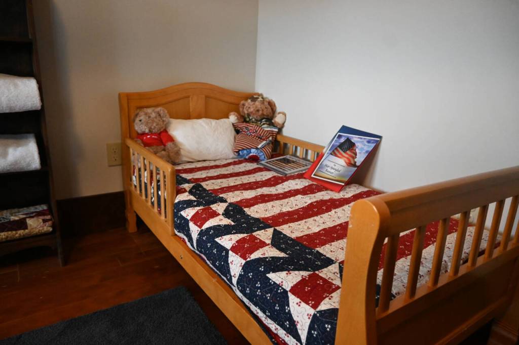 Sequim Gazette photo by Michael Dashiell / A look inside Captain Joseph House, a bed-and-breakfast turned respite home in Port Angeles for Gold Star families. This room features a childs bed with a stuffed animal clothed in a quilt made by the Sunbonnet Sue Quilt Club of Sequim.