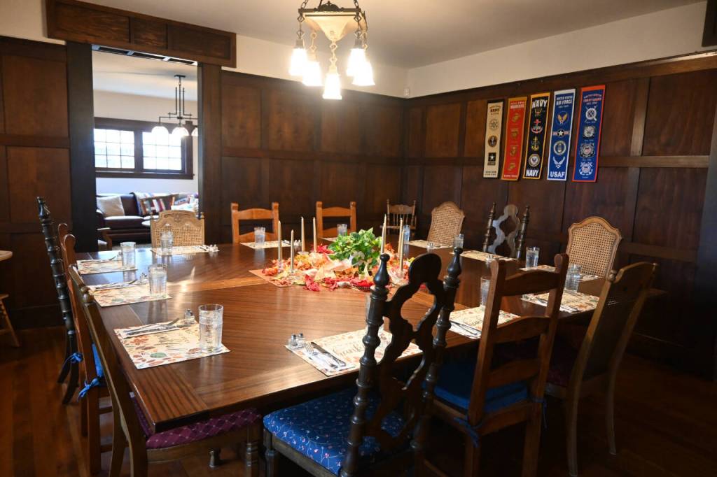 Sequim Gazette photo by Michael Dashiell / A look inside Captain Joseph House, a bed-and-breakfast turned respite home in Port Angeles for Gold Star families. Betsy Reed Schultz, founder of Captain Joseph House, said she wanted to have a table that could accommodate everyone with the visiting families, including children.