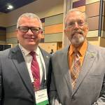 Photo courtesy of Clallam County Sheriffs Office/Facebook / Clallam County sheriff Brian King, left, helps honor retired Clallam County sheriff Bill Benedict with the Washington Association of Sheriff and Police Chiefs Lifetime Member Award.