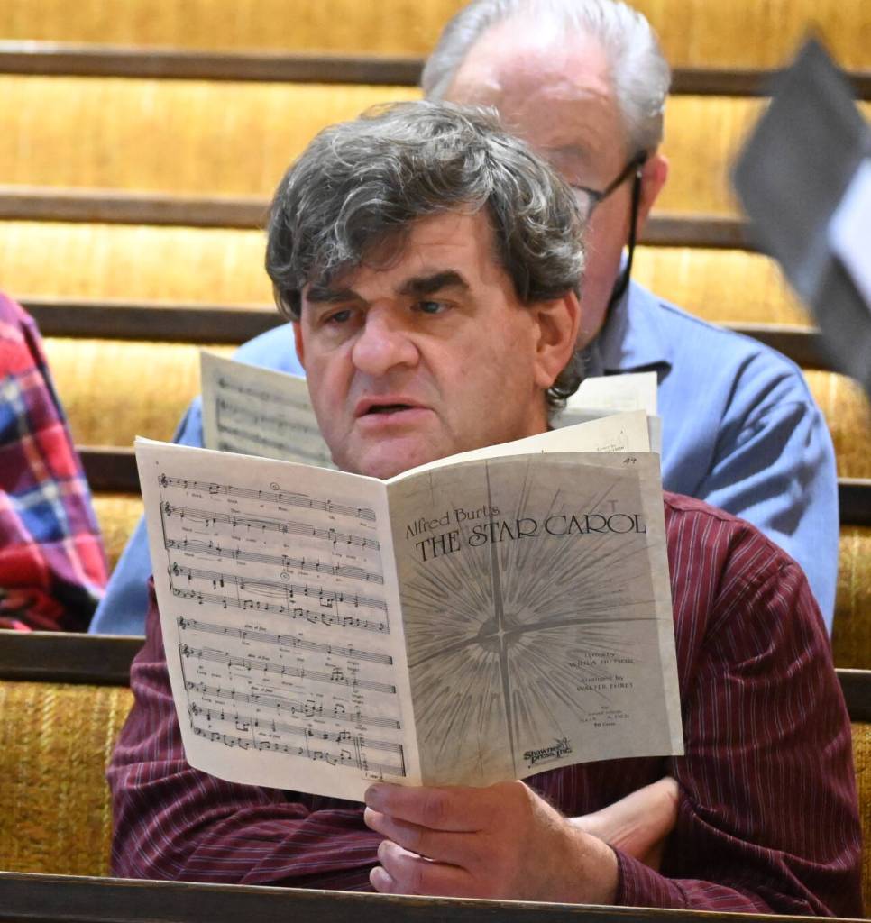 Sequim Gazette photo by Michael Dashiell / Singers rehearse at Sequim Seventh-day Adventist Church in mid-November for upcoming Sequim Community Christmas Chorus performances.