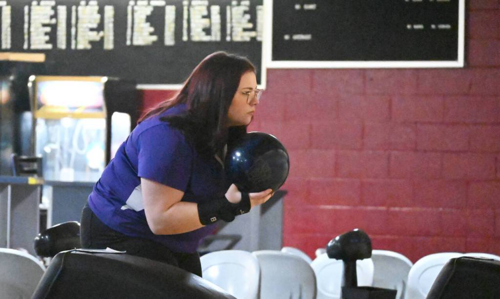 Sequim Gazette photo by Michael Dashiell / Sequims Morgan Kayser lines up a shot as she and th Wolves take on Klahowya on nov. 16. Kayser bowled a 151-pin second game against Bremerton on Nov. 21.