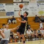Sequim Gazette photos by Michael Dashiell
Sequim High senior Keenan Green, pictured here driving in for a basket in SHSs alumni game in November, returns to lead the Wolves in 2023-24.