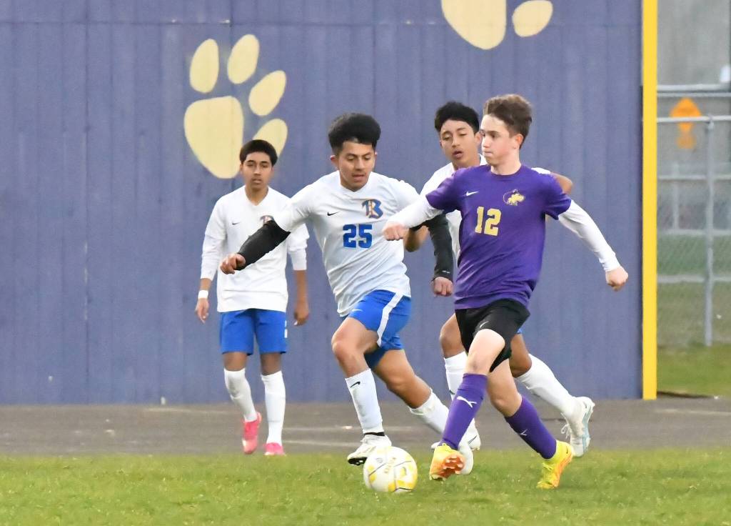 Photo by Jim Heintz
Sequims Joshua Alcaraz advances the ball in a March 30 match-up against Bremerton.