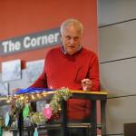 Sequim Gazette photo by Michael Dashiell / Sequim mayor Tom Ferrell reads aloud short messages from local students based on the theme, What Brings You Joy?, at the City of Sequims annual tree lighting ceremony and open house on Dec. 1.