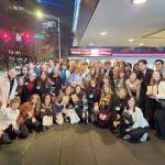 Photo courtesy of Colleen Robinson / Sequim High School Interact Club students pose in front of Seattles SIFF Cinema Downtown before a screening of The Boys in the Boat on Thursday, Dec. 7.