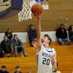 Sequim Gazette photo by Matthew Nash
Sequim freshman Mason Rapelje goes up for a reverse layup against the Vashon Island Pirates on Dec. 9. Sequims varsity basketball squad won 84-44.