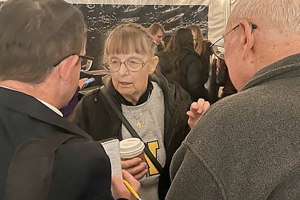 Sequim Gazette photo by Matthew Nash/ Judy Willman, daughter of Joe Rantz, talks with Editor Michael Dashiell during the Tribute to Joe Rantz fundraiser event at the Sequim Museum and Arts on Dec. 9. The Sequim Sunrise Rotary seeks funds to build a home for homeless youths in Sequim.
Sequim Gazette photo by Matthew Nash/ Judy Willman, daughter of Joe Rantz, talks with <em>Sequim Gazette</em> Editor Michael Dashiell during the Tribute to Joe Rantz fundraiser event at the Sequim Museum and Arts on Dec. 9. The Sequim Sunrise Rotary seeks funds to build a home for homeless youths in Sequim.