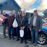 Photo courtesy Sequim Food Bank
Members of the Olympic Peninsula Chapter of Club Miata Northwest donate food, diapers, and money to the Sequim Food Bank. Pictured, from left, are Sequim Food Bank Executive Director Andra Smith, and club members Tom Davies, Jim Ragan, Barry Halsted, Tracy Halsted and Tom Clark.