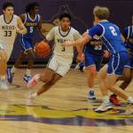 Sequim Gazette photo by Matthew Nash / Solomon Sheppard dribbles past halfcourt against past Bremerton on Dec. 12.