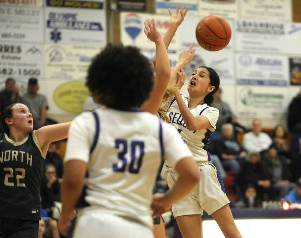 Sequim Gazette photo by Michael Dashiell / Sequims Gracie Chartraw gets fouled on a drive in the first half of the Wolves 56-40 home win over North Kitsap on Dec. 15.