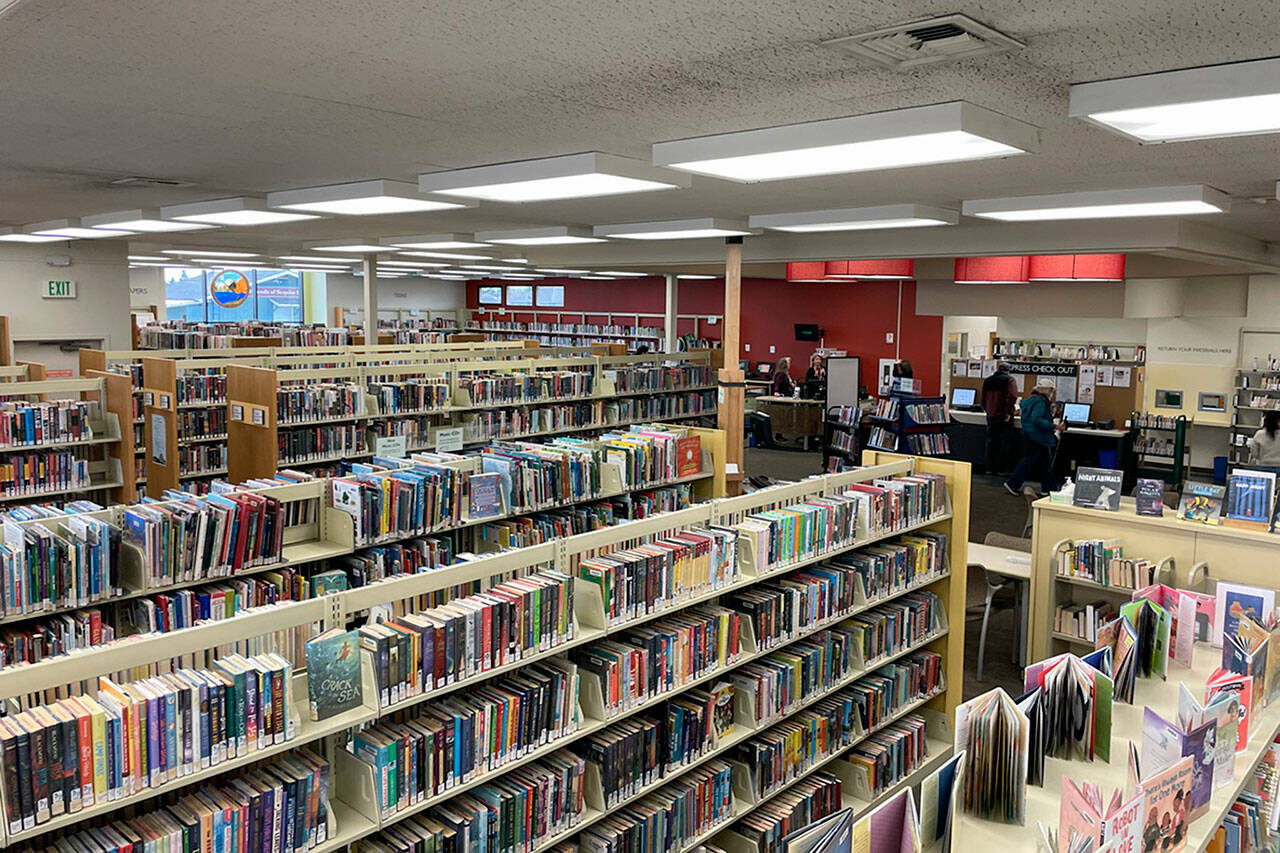 Sequim Gazette photoS by Matthew Nash
In March 2024, North Olympic Library Systems leaders anticipate their staff and a moving company relocating the contents of the Sequim Library to the former Brians Sporting Goods space. The library will close during the move and will have a temporary space open for about a year while the current library space is renovated and expanded.