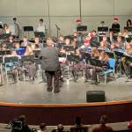 Sequim Gazette photo by Matthew Nash/ Sequim Middle School sixth graders play Jingle Bells at a joint holiday concert with other middle and high schoolers on Dec. 14.
