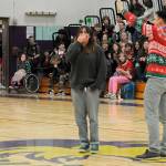Sequim Gazette photo by Matthew Nash/ Sequim High School students join teacher Sean OMera in singing Happy Birthday to junior Melia Nelson during the Winter Wishes assembly.