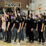 Sequim Gazette photo by Matthew Nash/ Sequim High Schools choir finishes a song with emphasis at the Winter Wishes assembly.