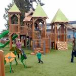 File photo by Keith Thorpe/Olympic Peninsula News Group / Children and parents roam through the Generation II Dream Playground at Erickson Playfield in Port Angeles on its dedication day in September 2021.