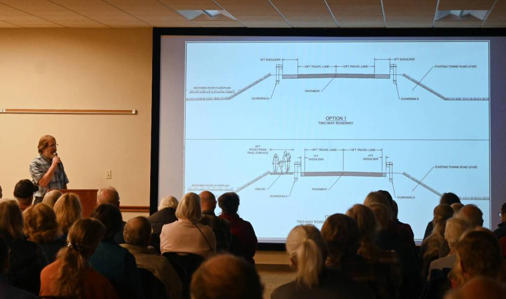 Sequim Gazette photo by Michael Dashiell / Joe Donisi, an engineer with the Clallam County Road Department, gives details on the Options 1 and 2 of four total lower Dungeness levee alternatives at a Sept. 26 public meeting in Sequim.