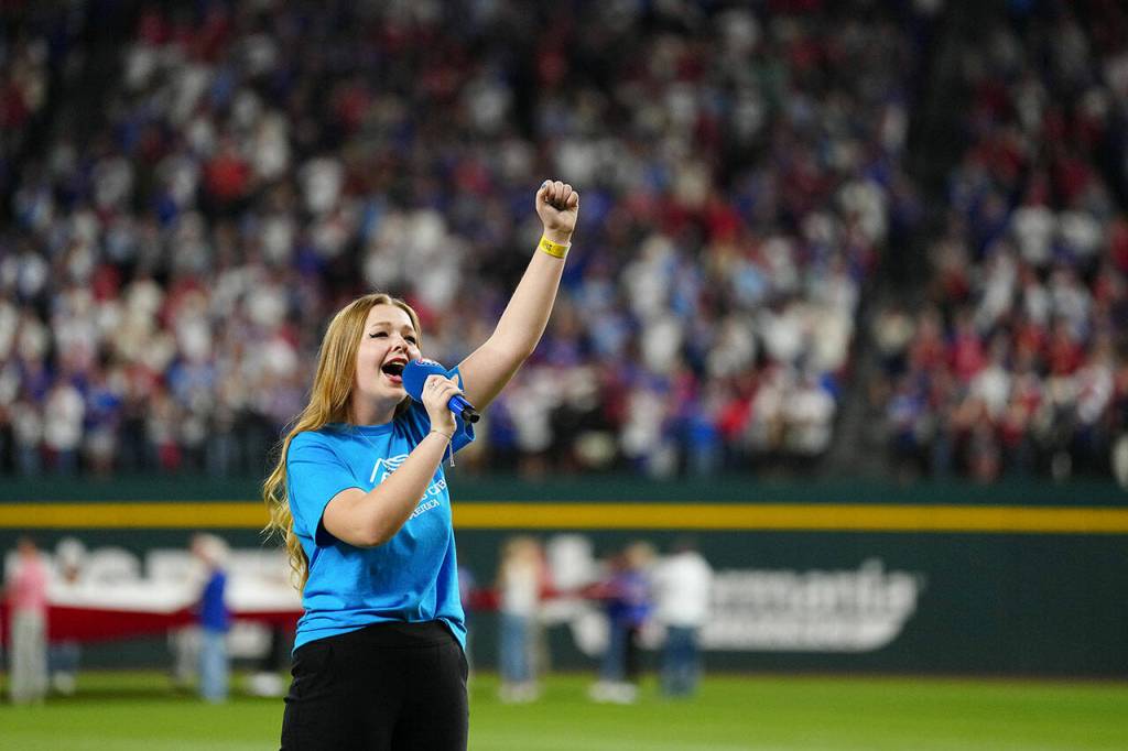 Photo by Daniel Shirey/MLB Photos
Boys & Girls Clubs youth performer Pearle Peterson of Sequim performs the national anthem prior to Game 2 of the 2023 World Series between the Arizona Diamondbacks and the Texas Rangers at Globe Life Field on Saturday, Oct. 28 in Arlington, Texas.