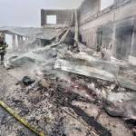 Photo by Jay Cline/Clallam County Fire District 2 / Firefighters from Clallam 2 Fire-Rescue and the Port Angeles Fire Department respond Sunday, May 7, to a fire at the Olympic National Park Day Lodge. The building was a total loss.