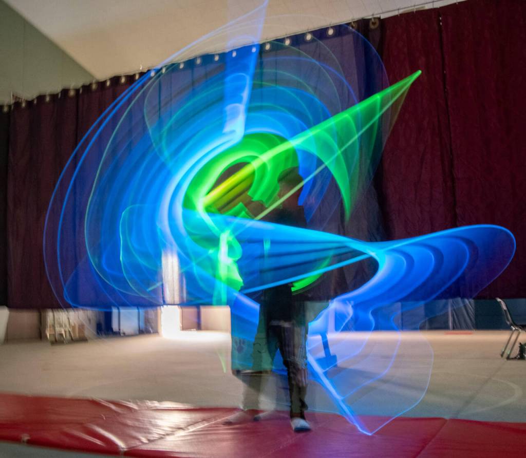 Sequim Gazette photo by Emily Matthiessen
Tomas Gonzales puts on a light show for an appreciative audience Greywolf Elementary Schools talent show in June.