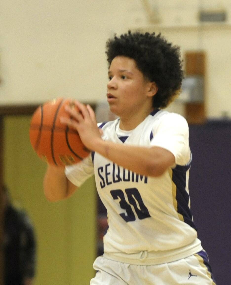 Sequim Gazette file photo by Michael Dashiell
Sequim guard Bobbi Mixon, pictured here looking for an open teammate in the Wolves Dec. 15 win over North Kitsap, led SHS with 16 points in a Dec. 23 win over Steilacoom.
