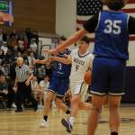 Sequim Gazette photo by Michael Dashiell
Sequims Keenan Green, center, drives past North Masons Cameron Revelez in the first half of SHSs 70-56 home win on Jan. 2. Looking on is North Masons Derek Dunham (35).