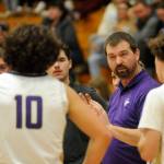 Sequim Gazette photo by Michael Dashiell / Sequim High varsity coach Craig Brooks talks with players early in the second half of the Wolves 70-56 win over North Mason on Jan. 2.