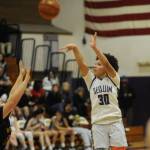Sequim Gazette photo by Michael Dashiell / Sequims Bobbi Mixon, right, takes a jumpshot in the Wolves 51-41 win over Kingston on Jan. 5.
