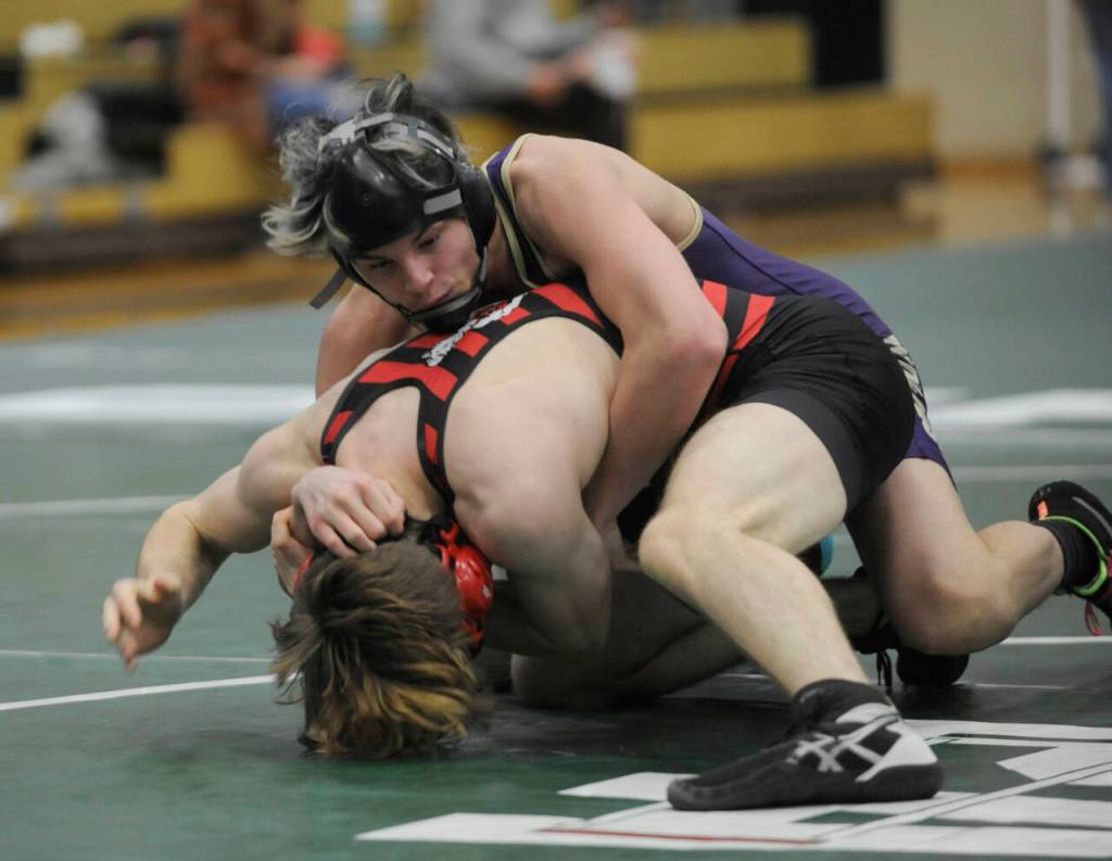 Sequim Gazette photo by Michael Dashiell / Sequims Jayms Vilona, top, looks to stay in control of a Battle of the Axe match against Camas Thomas Burket on Jan. 6 in Port Angeles. Vilona won by technical fall, 18-3.