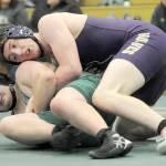 Photo by Keith Thorpe/Olympic Peninsula News Group / Sequims Dylan Bowen, top, tries to contain Port Angeles Hunter Blore in the 190-pound category at the Battle of the Axe tournament at Port Angeles High School on Jan. 6.