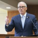 Photo courtesy of Washington State Journal /Gov. Jay Inslee addresses reporters before the start of this years Legislative session.
