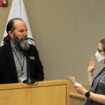 Sequim Gazette photo by Matthew Nash/ Dan Butler takes his oath office from city clerk Amy Aschenbrenner for Sequim city council seat No. 2 on Jan. 8 in the council chambers.