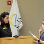Sequim Gazette photo by Matthew Nash/ Harmony Rutter takes her oath office from city clerk Amy Aschenbrenner for Sequim city council seat No. 6 on Jan. 8 in the council chambers.