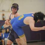Sequim Gazette photo by Michael Dashiell
Sequims John Prorok, left, takes down Bremertons Cole Sanford in the 215-pound weight class of an Olympic League match on Jan. 10. in Sequim.