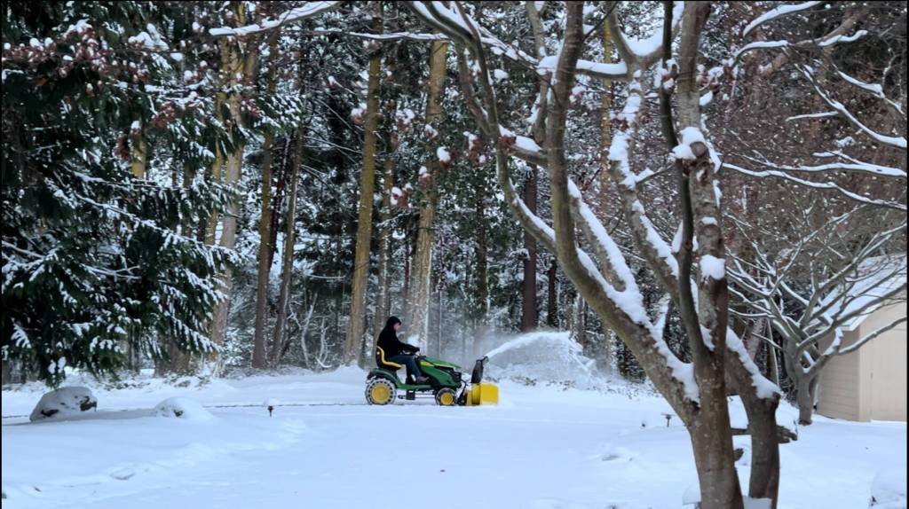 Photo by Caron Garliepp
Randy Garliepp braves the 17-degree chill to clear his driveway near Blyn on Friday, Jan. 12. Caron Garliepp reports they got about 5 inches of snowfall.