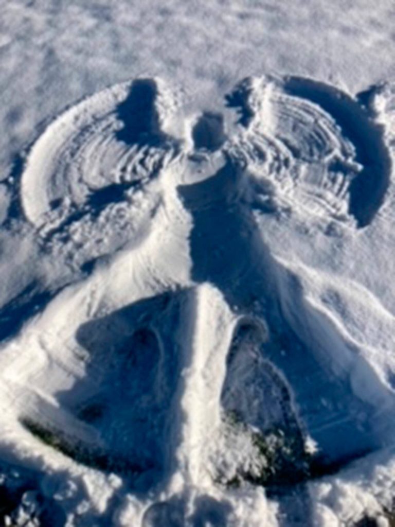 Photo by Kristy Bowman/ Kristy Bowman snaps a picture of her snow angel after Sequims recent snowfall.