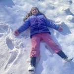 Photo by Emily Coler / Nearly-7-year-old Paisley works on her snow angel on Friday, Jan. 12.