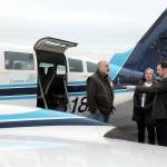 Photo by Keith Thorpe/Olympic Peninsula News Group
Clint Ostler, president of Dash Air Shuttle, right, points out features of the Cessna 402C aircraft to Peter Metz, left, and Kim Reynolds, both of Port Angeles, during an open house for the air service on Jan. 16 at William R. Fairchild International Airport in Port Angeles.