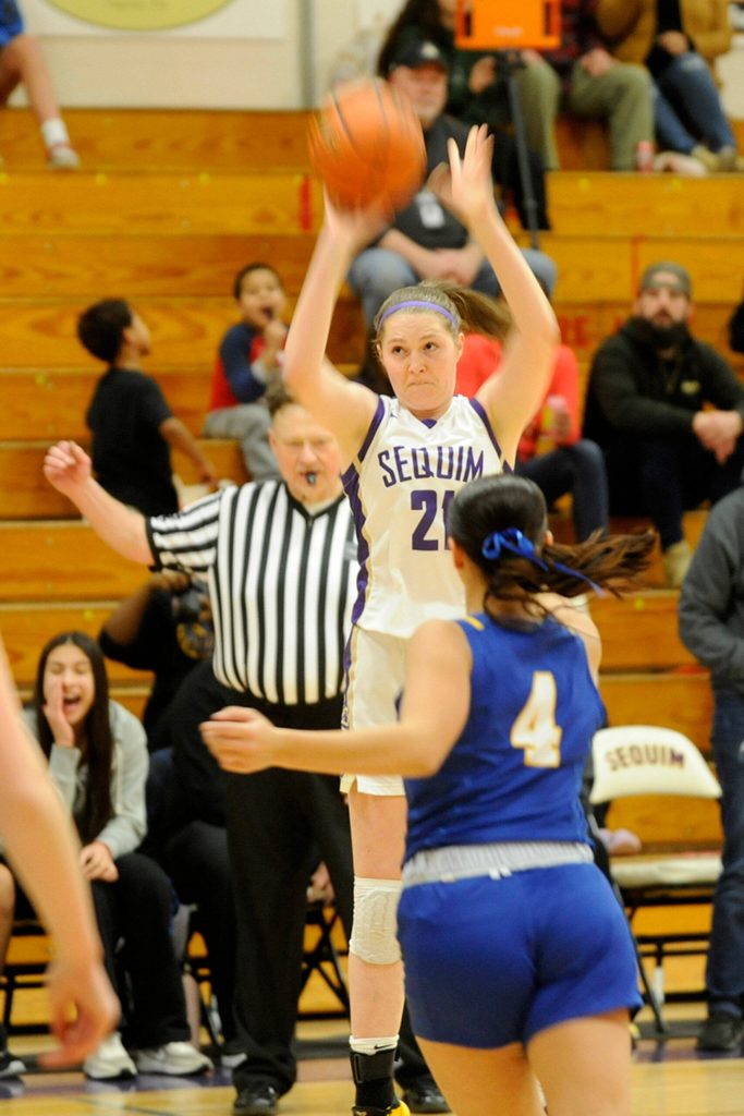 Sequim Gazette photo by Matthew Nash / Sequims Libby Turella shoots a jumper over the Bremerton defense in a 70-41 home win over the Knights on Jan. 19. Turella sank three 30-pointers and scored 11 in the win.