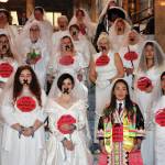 Photo by Aspen Anderson/Washington State Journal / Kate Yang (first row, second from right) protests child marriages in Olympia wearing a colorful wedding dress to honor her Hmong heritage.