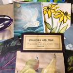 Photo courtesy Carrie Rodlend/ Along with framed art pieces for sale by Carrie Rodlend, a large collection of drawings is available for free or for a minimal donation to the Ramen Shop, a non-profit extension of Calvary Chapel Sequim, during the month of February.