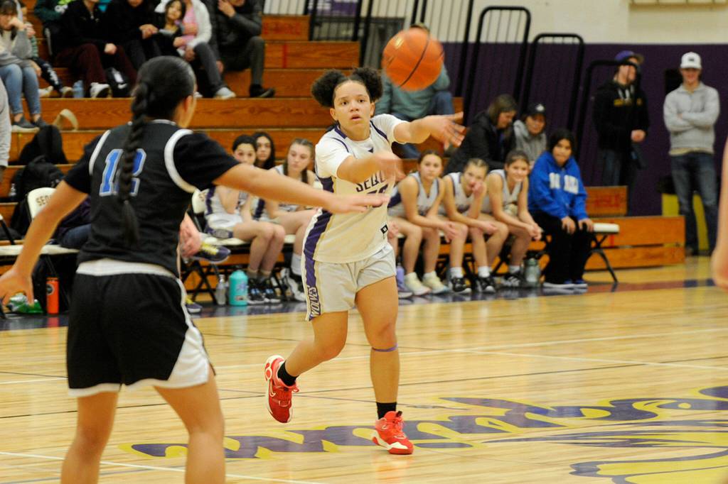 Sequim Gazette photo by Matthew Nash/ Bobbi Mixon finds an open teammate for a shot against North Mason on Jan. 26.